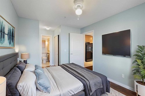 213-5115 Richard Road Sw, Calgary, AB - Indoor Photo Showing Bedroom