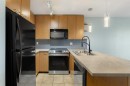213-5115 Richard Road Sw, Calgary, AB  - Indoor Photo Showing Kitchen With Double Sink 