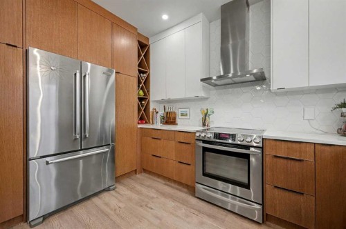 124 Country Hills Gardens Nw, Calgary, AB - Indoor Photo Showing Kitchen With Stainless Steel Kitchen