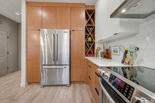 124 Country Hills Gardens Nw, Calgary, AB - Indoor Photo Showing Kitchen With Stainless Steel Kitchen
