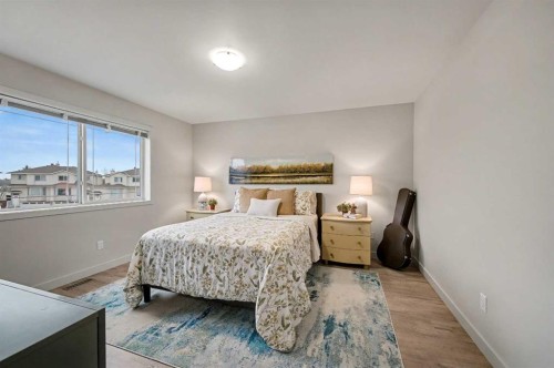 124 Country Hills Gardens Nw, Calgary, AB - Indoor Photo Showing Bedroom