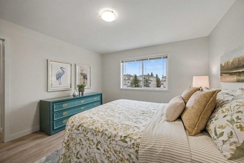 124 Country Hills Gardens Nw, Calgary, AB - Indoor Photo Showing Bedroom