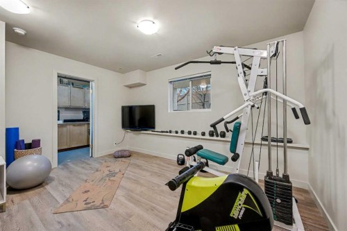 124 Country Hills Gardens Nw, Calgary, AB - Indoor Photo Showing Gym Room