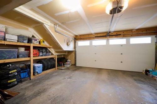 124 Country Hills Gardens Nw, Calgary, AB - Indoor Photo Showing Garage