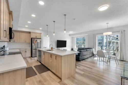 1311-33 Carringham Gate Nw, Calgary, AB - Indoor Photo Showing Kitchen With Upgraded Kitchen