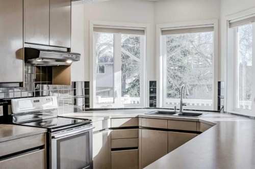 127 Canterbury Court Sw, Calgary, AB - Indoor Photo Showing Kitchen With Double Sink