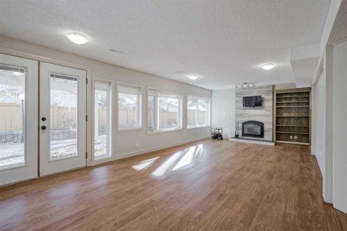 127 Canterbury Court Sw, Calgary, AB - Indoor With Fireplace