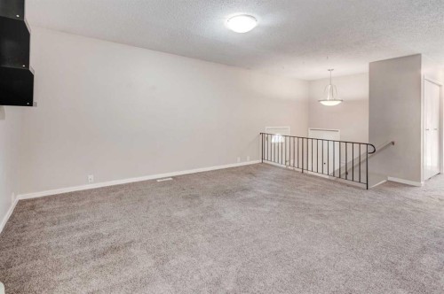 43 Midridge Gardens Se, Calgary, AB - Indoor Photo Showing Other Room