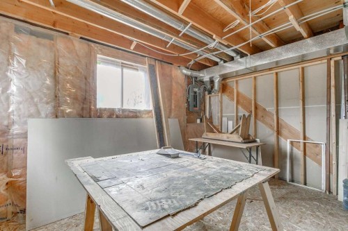 102 1 Avenue, Rural Foothills County, AB - Indoor Photo Showing Basement