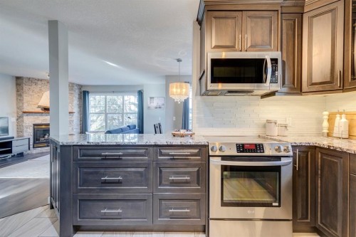 3101-7171 Coach Hill Road Sw, Calgary, AB - Indoor Photo Showing Kitchen With Stainless Steel Kitchen With Upgraded Kitchen