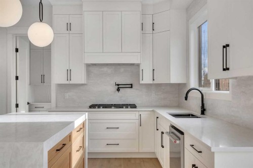 236 East Lakeview Place, Chestermere, AB - Indoor Photo Showing Kitchen With Double Sink With Upgraded Kitchen