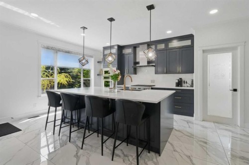 31 Lynx Meadows Court Nw, Calgary, AB - Indoor Photo Showing Kitchen With Double Sink With Upgraded Kitchen