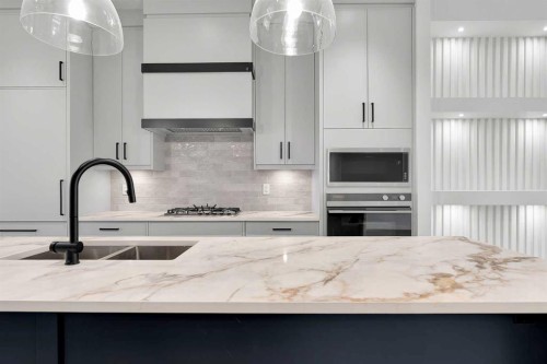 2526 7 Avenue Nw, Calgary, AB - Indoor Photo Showing Kitchen With Double Sink With Upgraded Kitchen