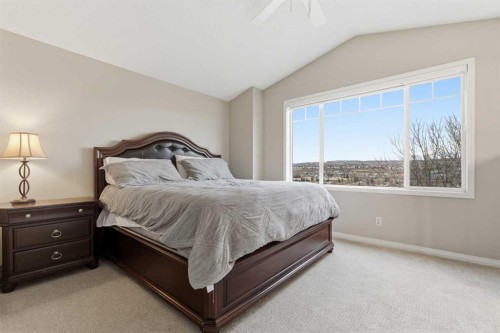 167 Hidden Creek Gardens Nw, Calgary, AB - Indoor Photo Showing Bedroom