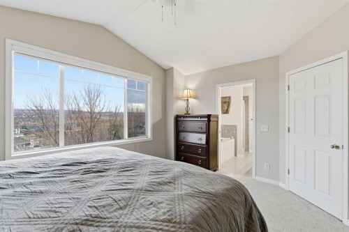 167 Hidden Creek Gardens Nw, Calgary, AB - Indoor Photo Showing Bedroom