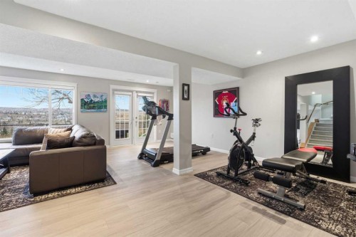 167 Hidden Creek Gardens Nw, Calgary, AB - Indoor Photo Showing Gym Room