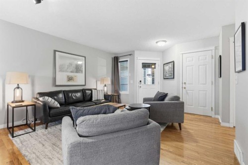 167 Hidden Creek Gardens Nw, Calgary, AB - Indoor Photo Showing Living Room