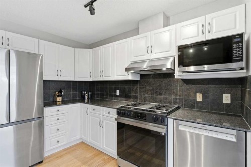 167 Hidden Creek Gardens Nw, Calgary, AB - Indoor Photo Showing Kitchen With Upgraded Kitchen