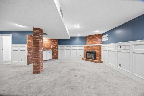 10444 Maplecreek Drive Se, Calgary, AB - Indoor With Fireplace