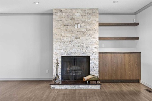 10444 Maplecreek Drive Se, Calgary, AB - Indoor Photo Showing Living Room With Fireplace