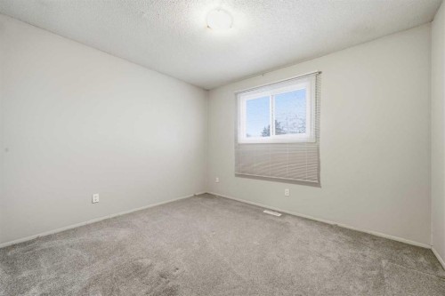 306-2200 Woodview Drive Sw, Calgary, AB - Indoor Photo Showing Other Room