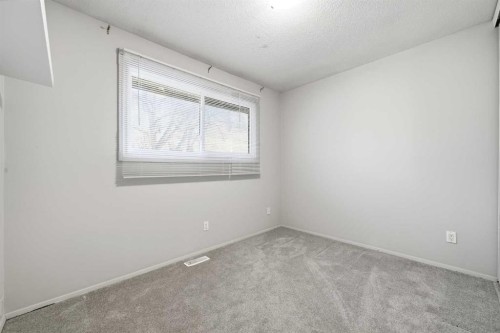 306-2200 Woodview Drive Sw, Calgary, AB - Indoor Photo Showing Other Room