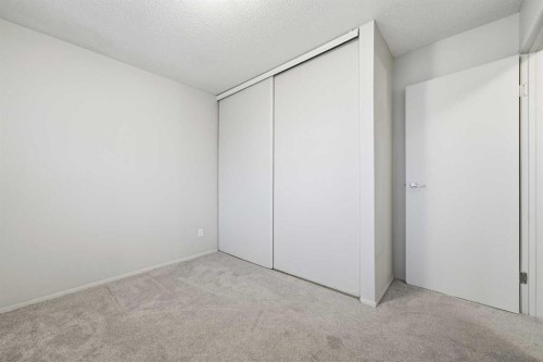 306-2200 Woodview Drive Sw, Calgary, AB - Indoor Photo Showing Other Room