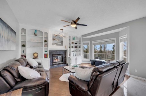 1081 Panorama Hills Landing Nw, Calgary, AB - Indoor Photo Showing Living Room With Fireplace
