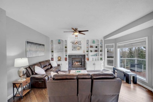 1081 Panorama Hills Landing Nw, Calgary, AB - Indoor Photo Showing Living Room With Fireplace