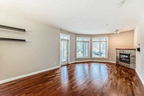 106-6 Hemlock Crescent Sw, Calgary, AB - Indoor With Fireplace