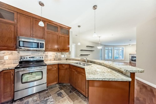 106-6 Hemlock Crescent Sw, Calgary, AB - Indoor Photo Showing Kitchen With Double Sink