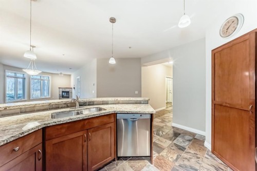 106-6 Hemlock Crescent Sw, Calgary, AB - Indoor Photo Showing Kitchen With Double Sink