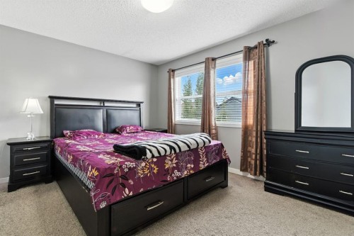 313 Kings Heights Drive Se, Airdrie, AB - Indoor Photo Showing Bedroom