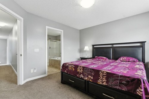313 Kings Heights Drive Se, Airdrie, AB - Indoor Photo Showing Bedroom