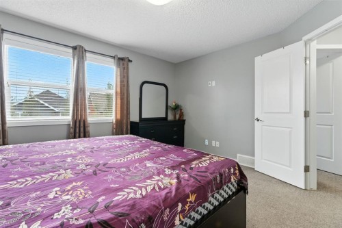 313 Kings Heights Drive Se, Airdrie, AB - Indoor Photo Showing Bedroom