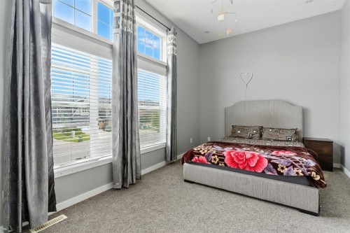 313 Kings Heights Drive Se, Airdrie, AB - Indoor Photo Showing Bedroom