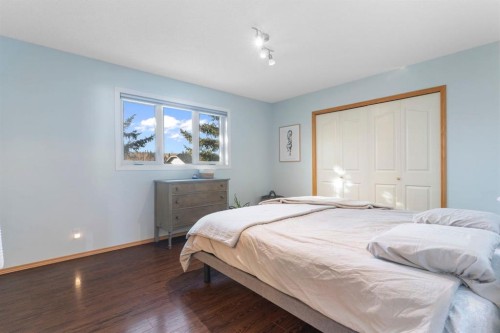 179 Quigley Drive, Cochrane, AB - Indoor Photo Showing Bedroom