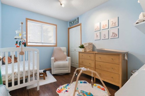 179 Quigley Drive, Cochrane, AB - Indoor Photo Showing Bedroom