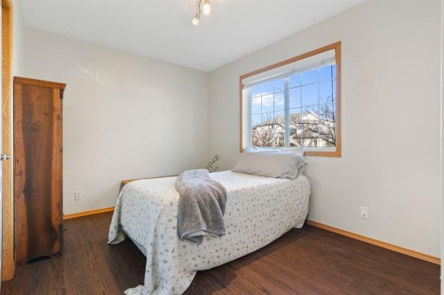 179 Quigley Drive, Cochrane, AB - Indoor Photo Showing Bedroom