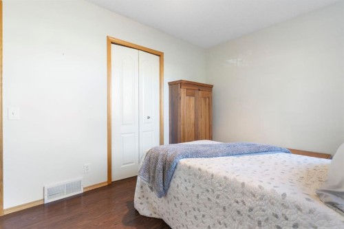 179 Quigley Drive, Cochrane, AB - Indoor Photo Showing Bedroom