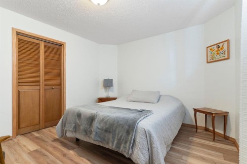 179 Quigley Drive, Cochrane, AB - Indoor Photo Showing Bedroom