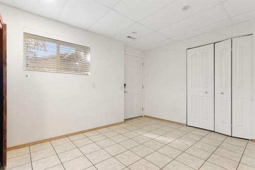 179 Quigley Drive, Cochrane, AB - Indoor Photo Showing Other Room