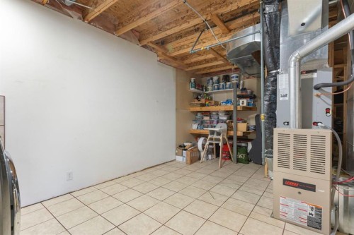 179 Quigley Drive, Cochrane, AB - Indoor Photo Showing Basement
