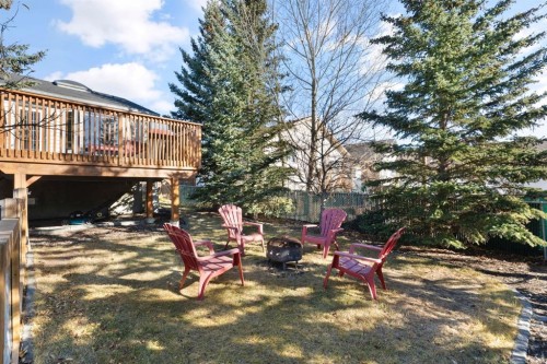 179 Quigley Drive, Cochrane, AB - Outdoor With Deck Patio Veranda