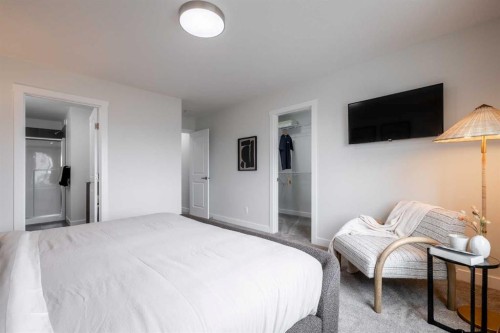 79 Saddlebred Place, Cochrane, AB - Indoor Photo Showing Bedroom