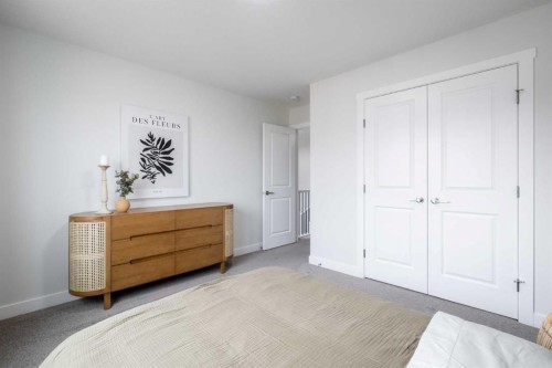 79 Saddlebred Place, Cochrane, AB - Indoor Photo Showing Bedroom