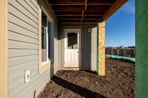 79 Saddlebred Place, Cochrane, AB - Outdoor With Exterior