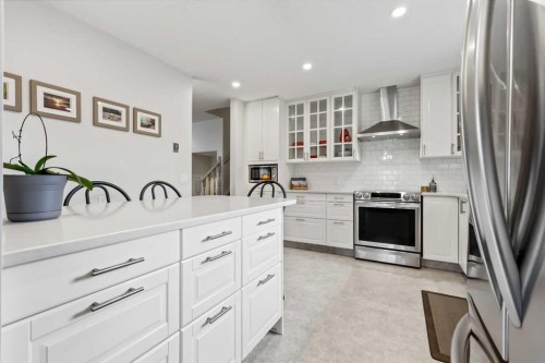103 Sandarac Place Nw, Calgary, AB - Indoor Photo Showing Kitchen With Stainless Steel Kitchen