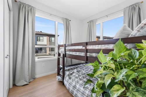 1203-42 Cranbrook Gardens Se, Calgary, AB - Indoor Photo Showing Bedroom
