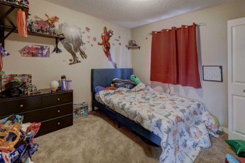469 Morningside Way Sw, Airdrie, AB - Indoor Photo Showing Bedroom